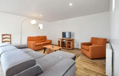 Coin salon dans l'établissement Maison De Charme Proche Mer