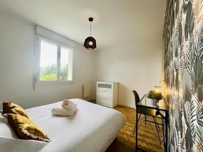 Un ou plusieurs lits dans un hébergement de l'établissement Le Logis des Pres Country Stay