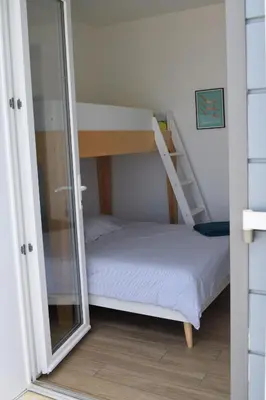 Un ou plusieurs lits dans un hébergement de l'établissement Le Bain des Dames