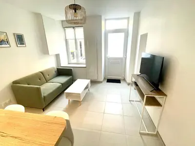 Télévision ou salle de divertissement dans l'établissement Les Clés de Saint-Pierre