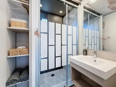 Salle de bains dans l'établissement Cottage Le Béluga