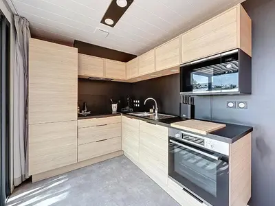 Cuisine ou kitchenette dans l'établissement Cottage Le Béluga