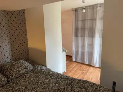 Un ou plusieurs lits dans un hébergement de l'établissement Appartement campagne normande
