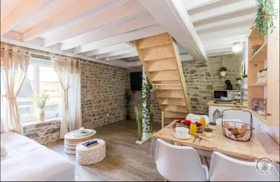Coin salon dans l'établissement Le refuge de l'hortensia 2