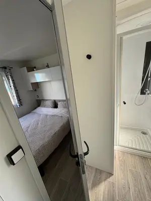 Un ou plusieurs lits dans un hébergement de l'établissement Bungalow tout confort 6 personnes