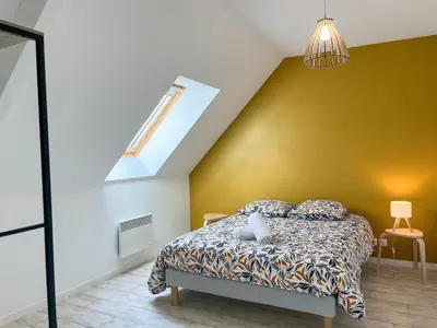 Un ou plusieurs lits dans un hébergement de l'établissement Maison T5 