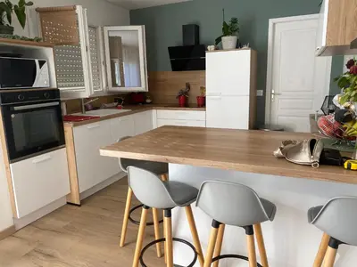 Cuisine ou kitchenette dans l'établissement Grande maison avec jardin bayeux