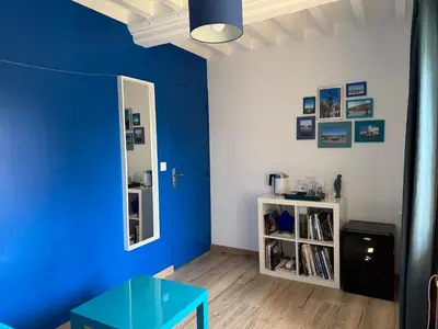 Télévision ou salle de divertissement dans l'établissement Chambre Le Mas du Bessin