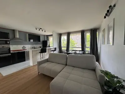 Cuisine ou kitchenette dans l'établissement Appartement Hérouville