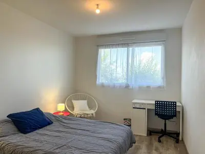 Un ou plusieurs lits dans un hébergement de l'établissement Maison Lévi - vue mer - 200m du port- classée 3 étoiles