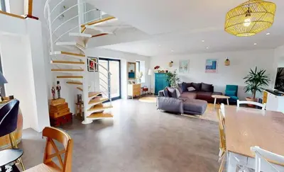 Coin salon dans l'établissement Maison familiale entre mer et campagne