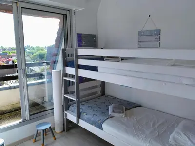 Un ou plusieurs lits dans un hébergement de l'établissement Joli appartement familial, 2 chambres, calme et soleil