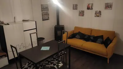 Coin salon dans l'établissement House in Caen