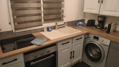 Cuisine ou kitchenette dans l'établissement House in Caen