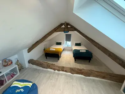 Un ou plusieurs lits dans un hébergement de l'établissement Maison de Vacances-Proche sites touristiques