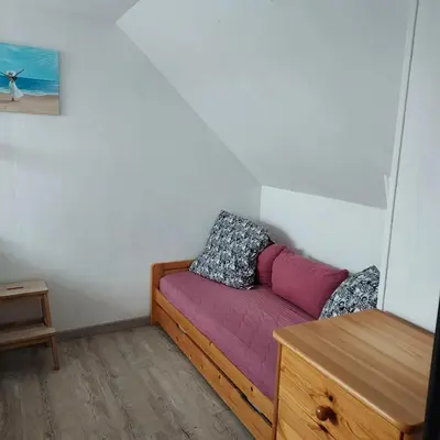 Un ou plusieurs lits dans un hébergement de l'établissement Petite maison de vacances