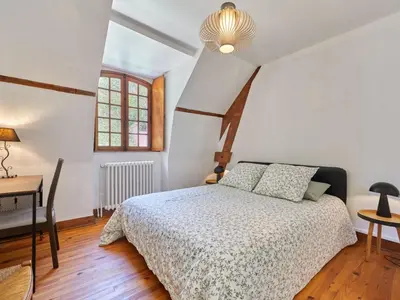 Un ou plusieurs lits dans un hébergement de l'établissement Holiday Home Le Pressoir de la laize by Interhome
