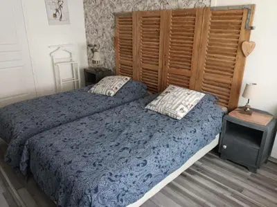 Un ou plusieurs lits dans un hébergement de l'établissement Gîte 27, Sté mère église