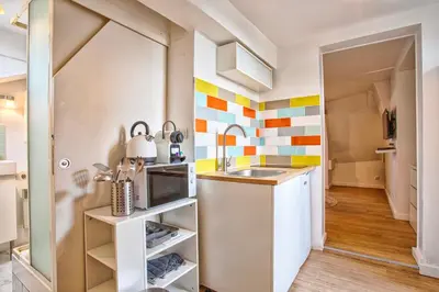 Cuisine ou kitchenette dans l'établissement Le Vauquelin - Hypercentre - Wifi