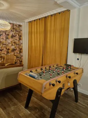 Salle de jeux dans l'établissement Chambre indépendante chez l'habitant