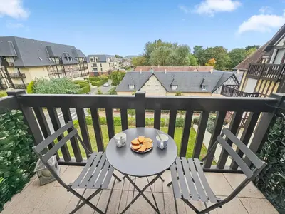 Balcon ou terrasse dans l'établissement Un souffle marin dans ce F2 à Cabourg