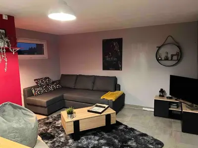 Coin salon dans l'établissement Gîte dans un petit haras
