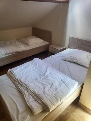 Un ou plusieurs lits dans un hébergement de l'établissement L'escapade 12 personnes 6 chambres
