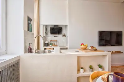 Cuisine ou kitchenette dans l'établissement Le Saint-Sauveur - Balneotherapy Bathtub - Hypercentre