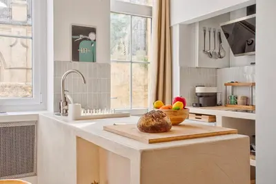 Cuisine ou kitchenette dans l'établissement Le Saint-Sauveur - Balneotherapy Bathtub - Hypercentre