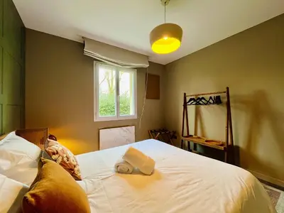 Un ou plusieurs lits dans un hébergement de l'établissement Minimaliste Oasis - Golf & Spa
