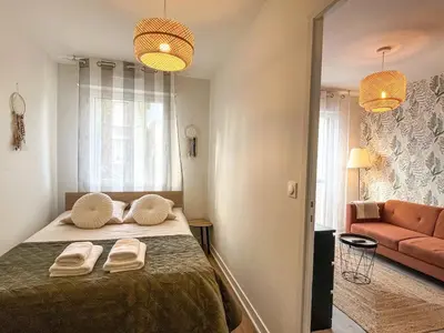Un ou plusieurs lits dans un hébergement de l'établissement T2 cosy avec parking gratuit & transports au pied