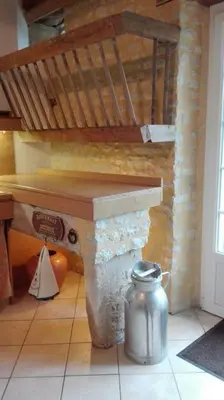 Cuisine ou kitchenette dans l'établissement Le Passé Composé