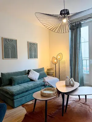 Coin salon dans l'établissement Appart City break Chic Cosy Wifi Caen Hyper centre