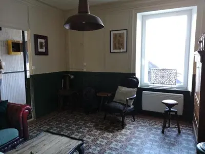 Coin salon dans l'établissement Maison bord de mer jonville