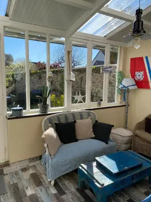 Coin salon dans l'établissement Maison bord de mer jonville