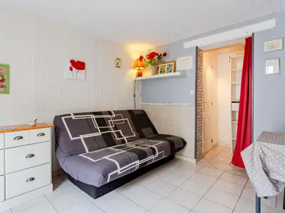 Coin salon dans l'établissement Apartment La Bourrasque by Interhome