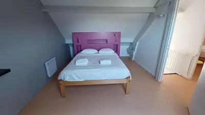 Un ou plusieurs lits dans un hébergement de l'établissement VVF Camping Les Dunes Créances - Plage du Cotentin