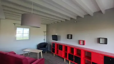 Coin salon dans l'établissement VVF Camping Les Dunes Créances - Plage du Cotentin