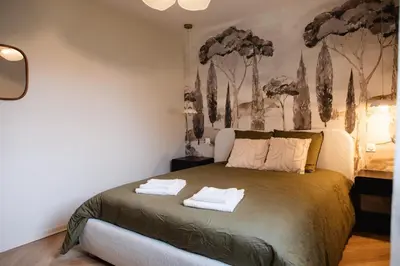 Un ou plusieurs lits dans un hébergement de l'établissement Maison-jardin-MontSaintMichel-Idéal pro et familles
