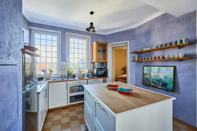 Cuisine ou kitchenette dans l'établissement Le Château Rêvé - Superbe appt vue mer