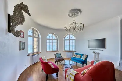 Télévision ou salle de divertissement dans l'établissement Le Château Rêvé - Superbe appt vue mer