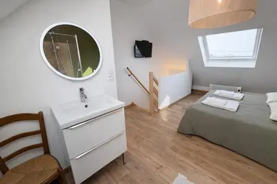 Un ou plusieurs lits dans un hébergement de l'établissement Cocon paisible proche de la mer - Jardin & Parking