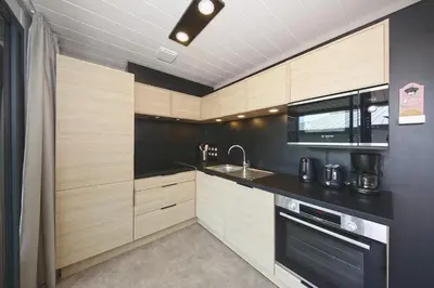 Cuisine ou kitchenette dans l'établissement Le Tranquillou