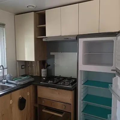 Cuisine ou kitchenette dans l'établissement Les Ch'tis Normands 2!