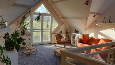 Coin salon dans l'établissement Maison d'architecte proche de Caen