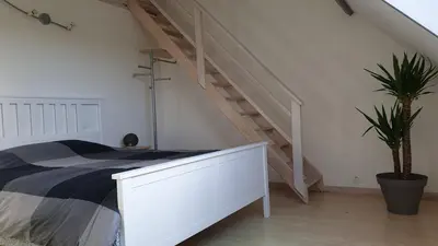 Un ou plusieurs lits dans un hébergement de l'établissement Maison d'architecte proche de Caen