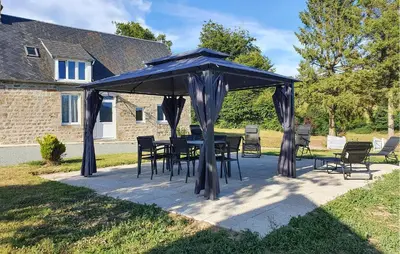 Jardin de l'établissement Charmante Maison Au Calme