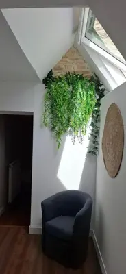 Coin salon dans l'établissement Gîte La Cauvignyere
