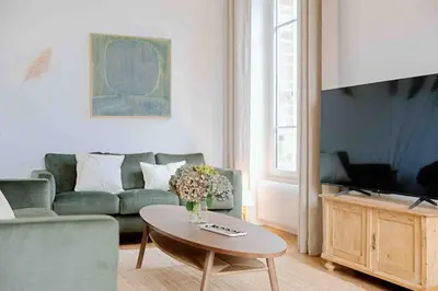 Télévision ou salle de divertissement dans l'établissement Villa des Genêts
