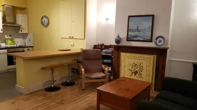 Cuisine ou kitchenette dans l'établissement French Village Living